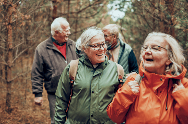 group of older adults considering dentures or implants at duffield health club